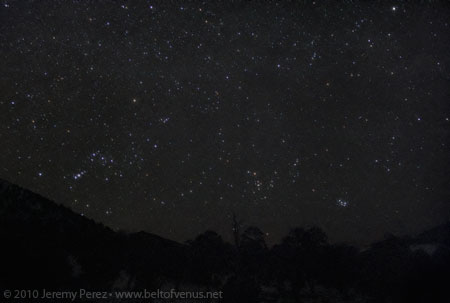 Photo of Mars, Procyon, and Sirius lining up over Sunset Crater