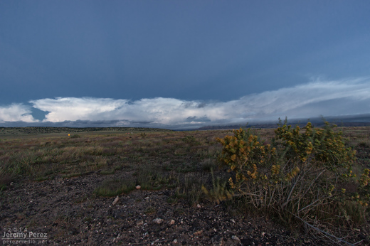 Anticrepuscular rays lead into a line of storms as seen looking west from Seligman, AZ. 6:05 AM / 1305Z